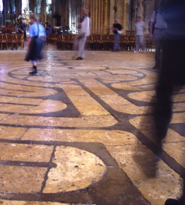 [IMAGE] Labyrinth at Chartres Cathedral. Visitors walking on an inlaid stone labyrinth